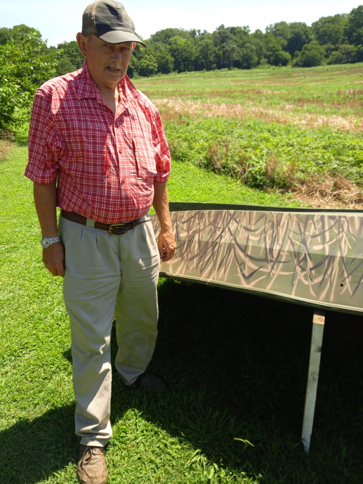 Billy Smith next to his Duck Blind Camo Boat painted by MyPerfectColor